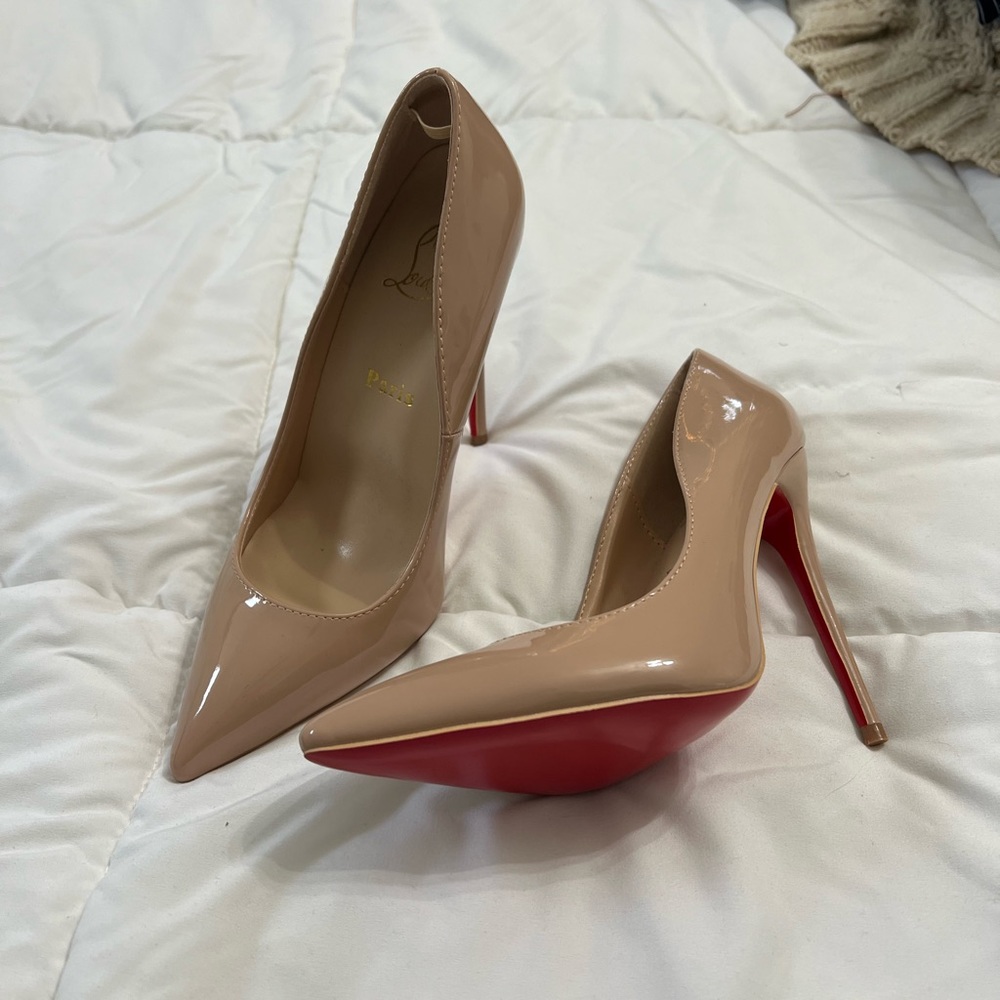 Red bottom shoes. Worn once size 7.5